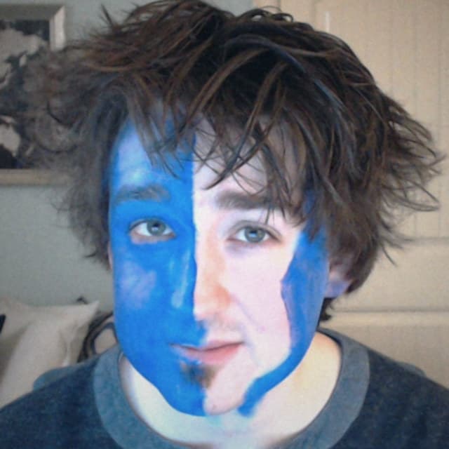 Justin in blue face paint